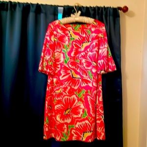 Lilly Pulitzer size 6 mini, just above the knee.